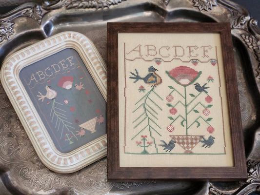 Sitting Pretty - Cross Stitch Pattern by 1884 Stitchery Designs PREORDER